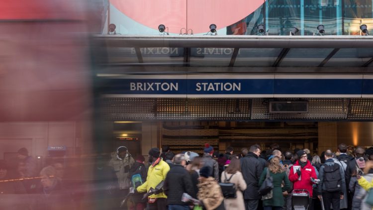 About us - Independent Foundation. Image shows people outside Brixton station